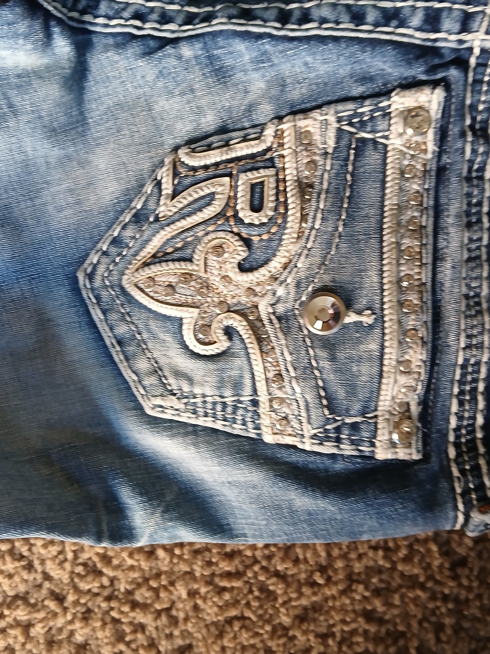 Rock Revival Distressed Blue Bootcut Jeans with Embellished Pocket
